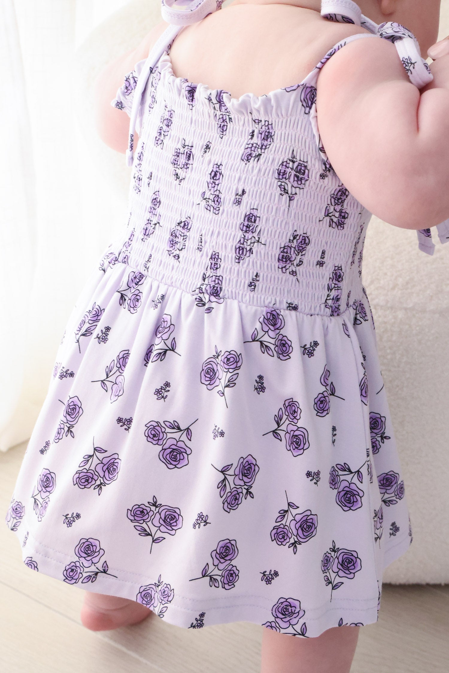 Smocked Twirl Bodysuit | Amethyst Garden