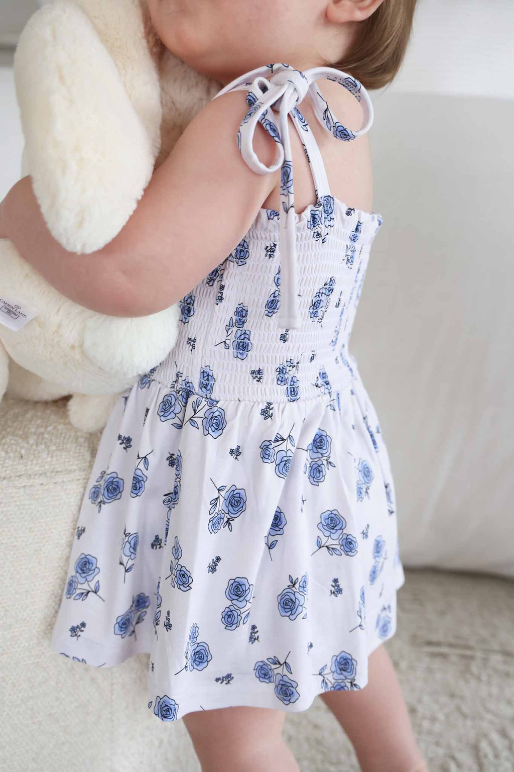 Smocked Twirl Bodysuit | Sapphire Garden